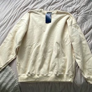 Brandy Melville | Eric Sweatshirt | Size: L/XL | BRAND NEW |